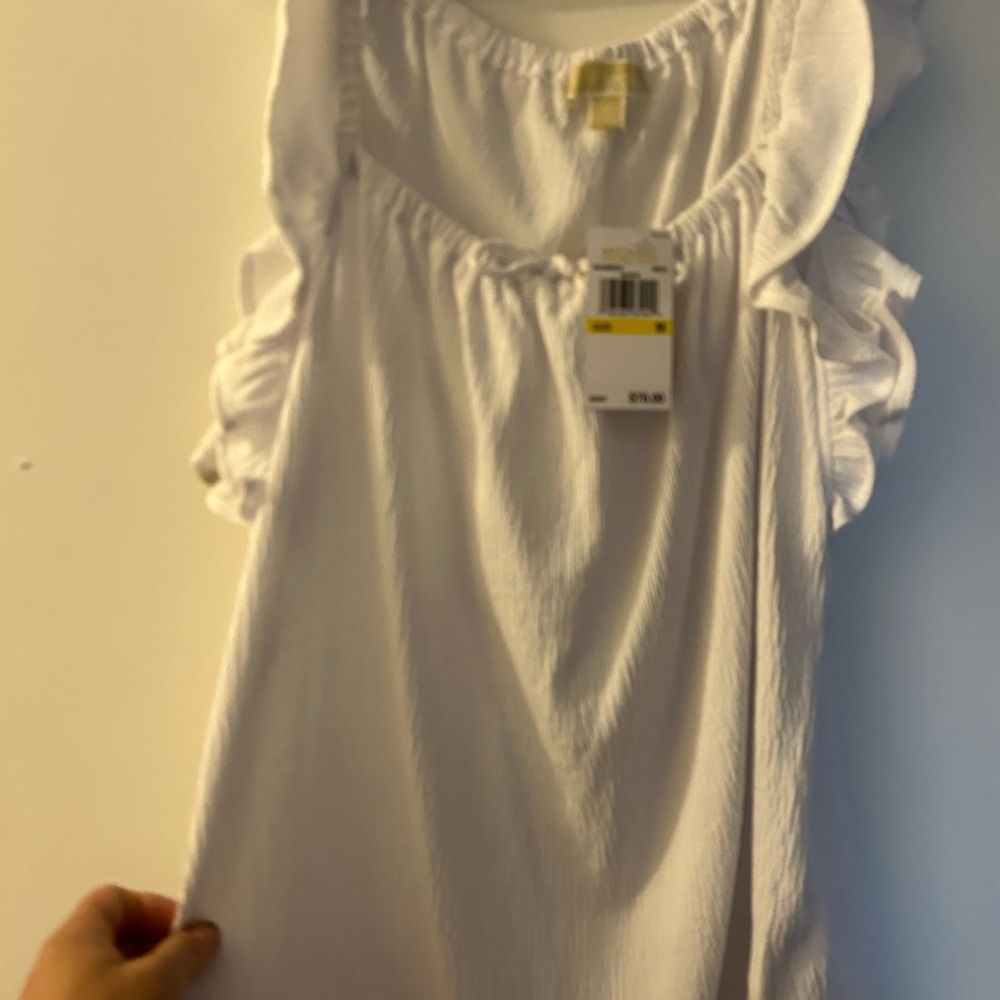 Michael Kors size medium with tags white top with ruffles